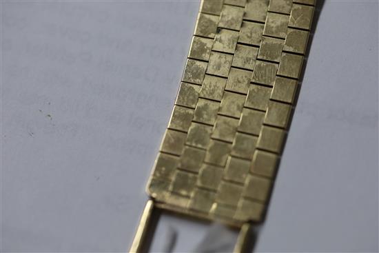 A gentlemans early 1960s 9ct gold Longines manual wind wrist watch, on a 9ct gold Longines bracelet, in Longines box.
